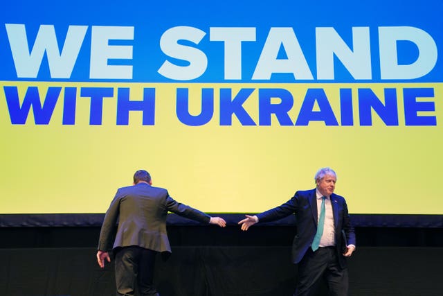 Douglas Ross and Boris Johnson shaking hands