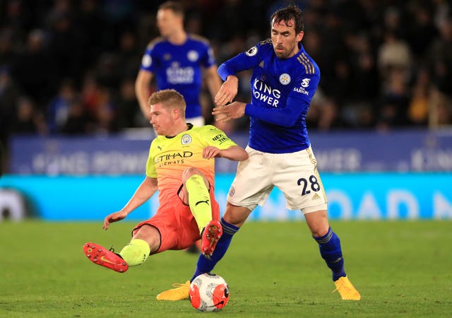 Christian Fuchs, right, helped Leicester win the Premier League title