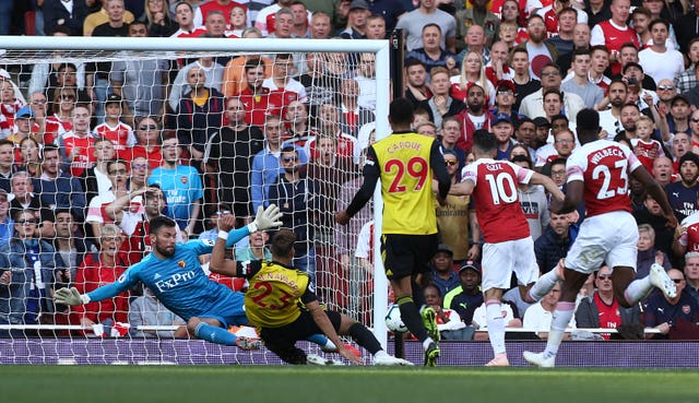 Mesut Ozil's second of the season helped see of Watford.
