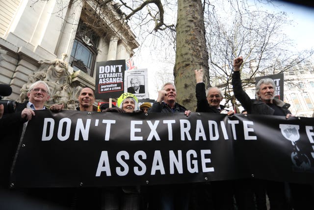 hundreds protest against extradition of julian assange ahead of