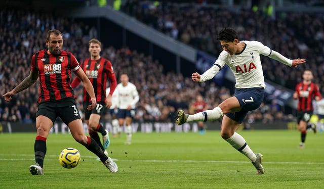 Son Heung-min, right, has a shot on goal