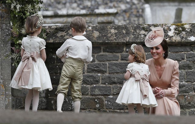 The Duchess of Cambridge with her daughter Princess Charlotte after the wedding of Pippa Middleton (Kirsty Wigglesworth/PA)