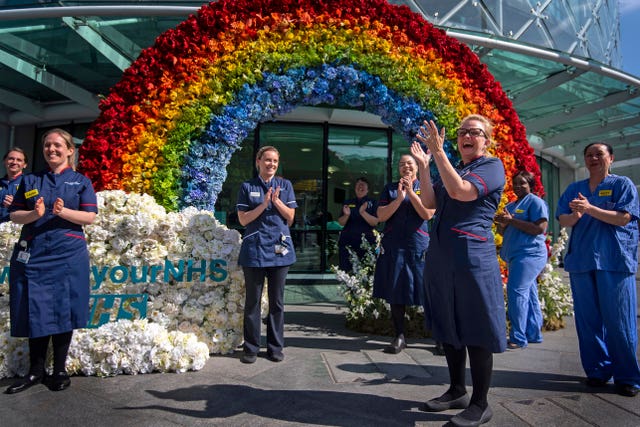 NHS nurses unveil a rainbow floral