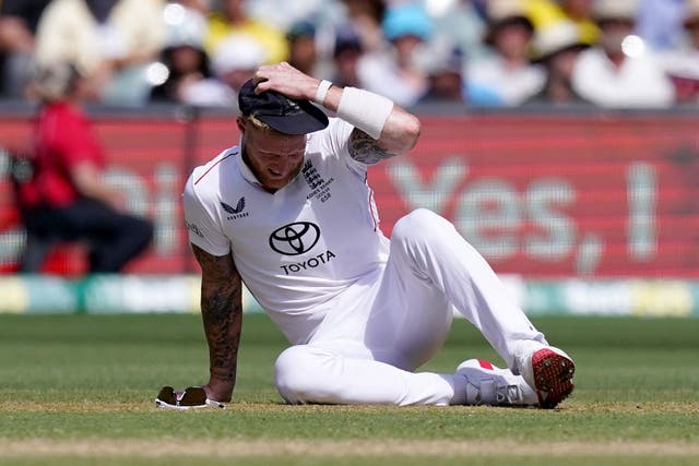 England captain Ben Stokes sits on the ground
