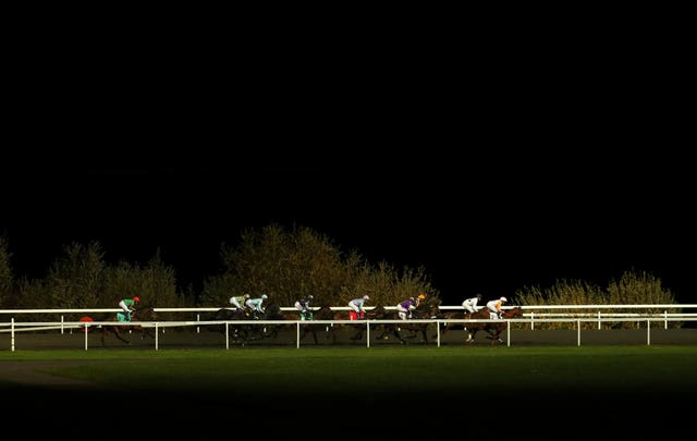 A general view of runners in action at Kempton Park