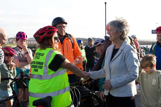 Presidential candidate Catherine Connolly, right