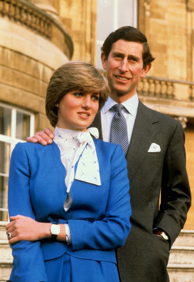 Prince of Wales and Lady Diana Spencer in the grounds of Buckingham Palace after announcing their engagement