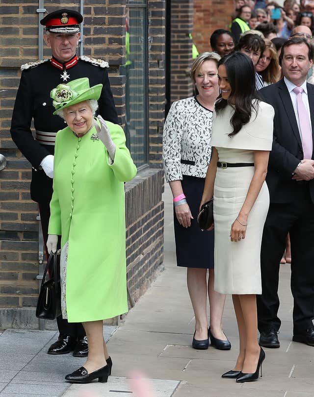 Queen Elizabeth II and the Duchess of Sussex arrive to visit Storyhouse Chester, where they will be taken on a tour of the building before unveiling a plaque to mark the official opening.
