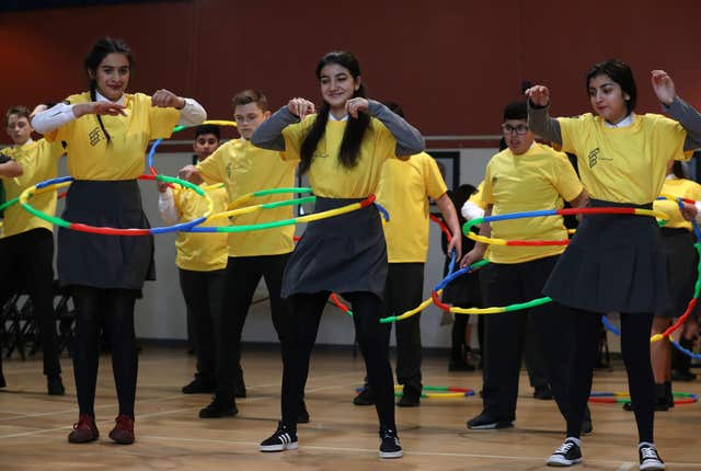 Hula hoop exercise at Holyrood Secondary School in Glasgow (Andrew Milligan/PA)