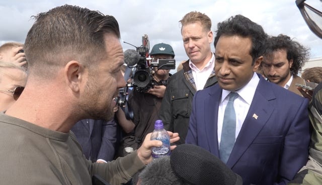 Daniel Thomas speaking to Reform UK home affairs spokesman Zia Yusuf in Portsmouth