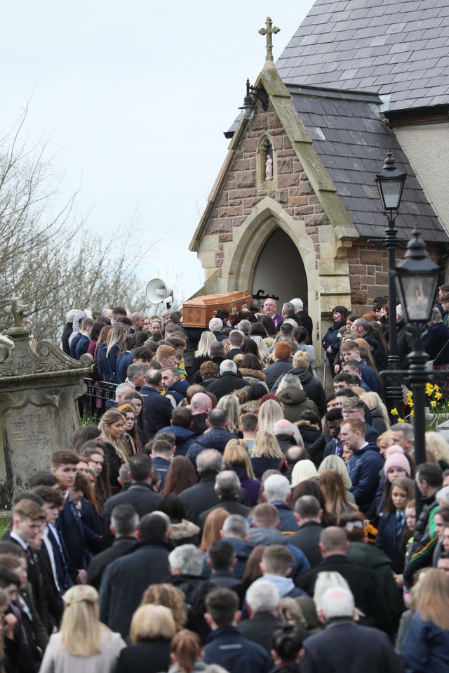The coffin arrives for the funeral of Connor Currie