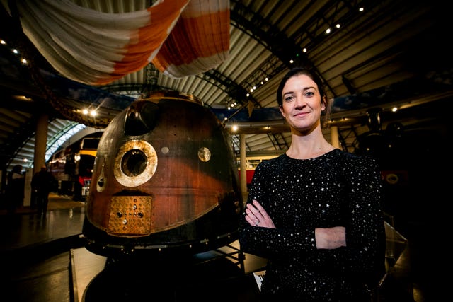 Norah Patten with the Soyuz capsule