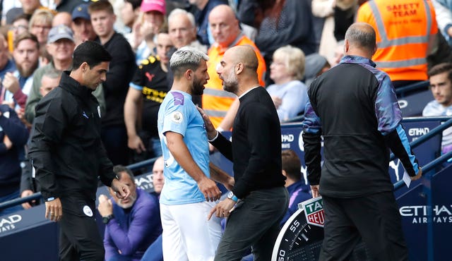 Pep Guardiola exchanges words with Sergio Aguero after substituting him 