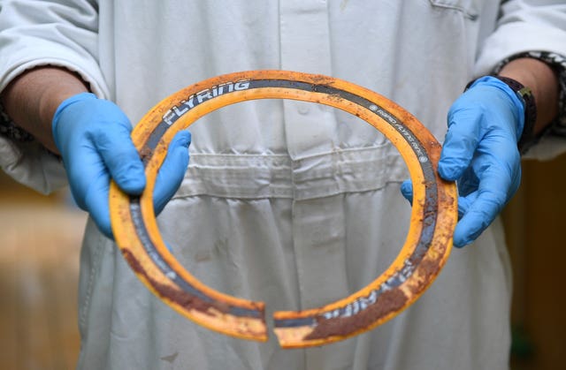 The plastic frisbee removed from the neck of Sir David