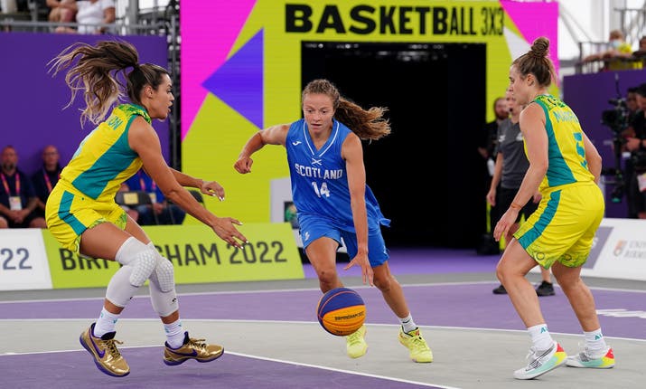 Scotland’s Kennedy Leonard drives past Australia’s Alex Wilson