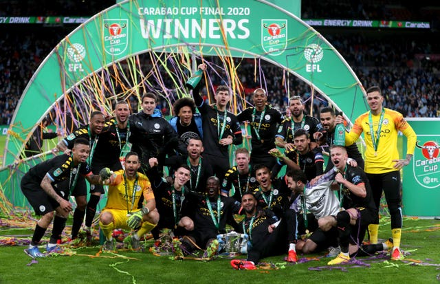 Manchester City players celebrate winning the Carabao Cup final
