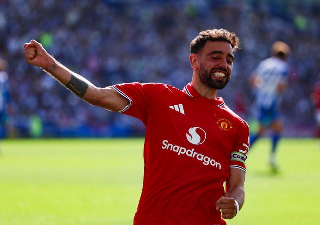 Bruno Fernandes celebrates after scoring Manchester United's third goal at Brighton