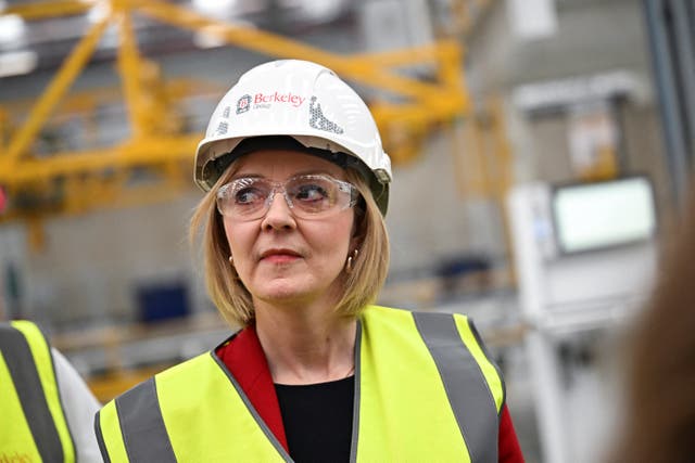 Liz Truss in hi-viz and hard hat
