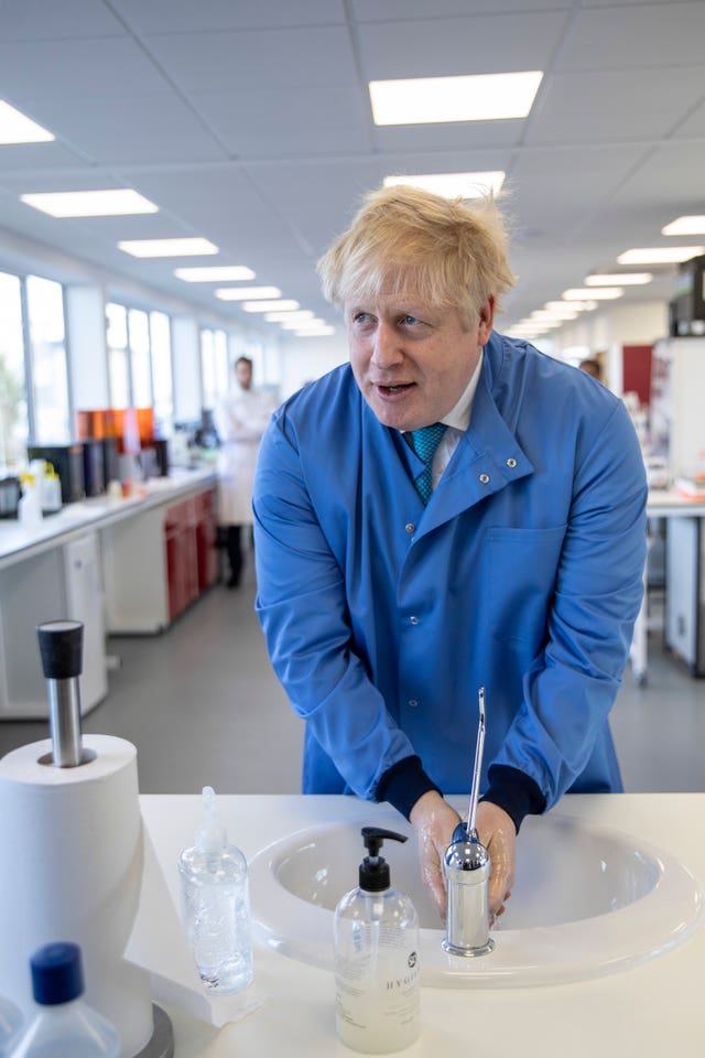 Prime Minister Boris Johnson during a visit to the Mologic Laboratory in Bedfordshire