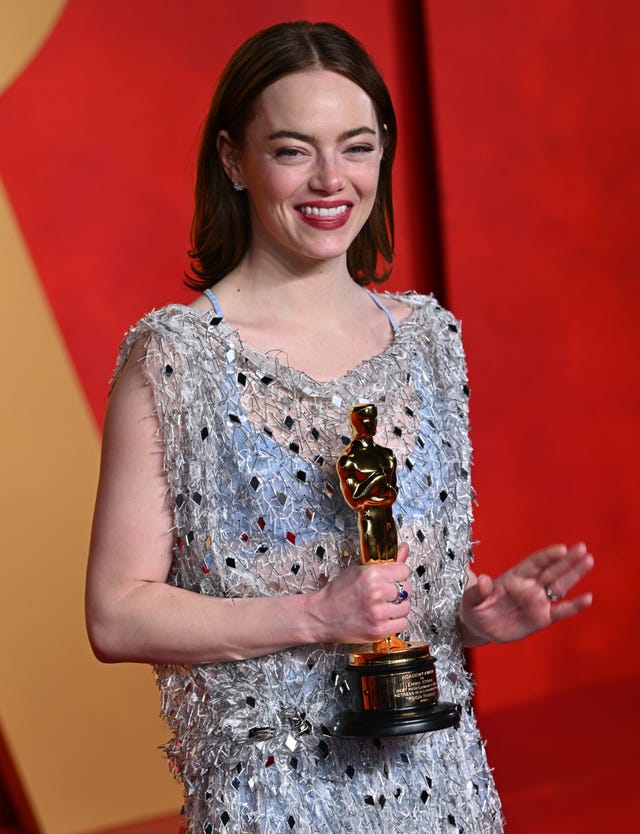 Emma Stone with her best actress Oscar for Poor Things in 2024