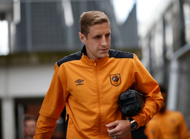 Michael Dawson arrives for a game with Hull