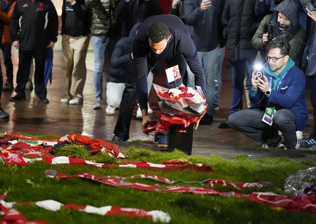 Trent Alexander-Arnold lays a tribute at Anfield's Diogo Jota memorial