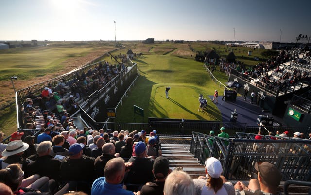 England's Richard Bland hits the opening shot in the 149th Open Championship at Royal St George's