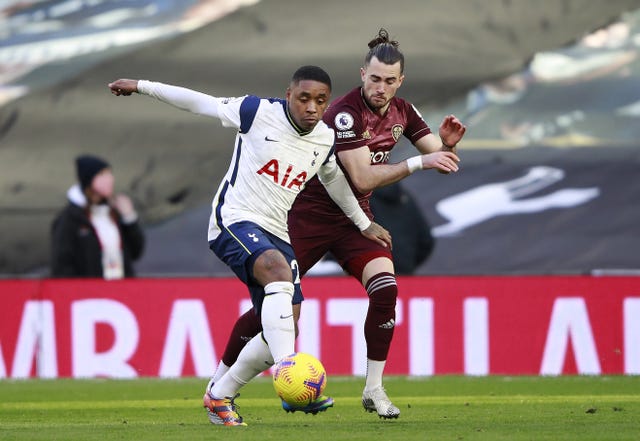 Steven Bergwijn, left, takes on Leeds' Jack Harrison