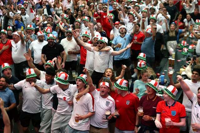Fans watch a screening of the FIFA World Cup match between England and DR Congo (Steven Paston/PA)