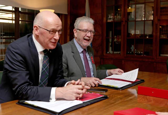 Scotland’s Deputy First Minister John Swinney and Brexit Minister Mike Russell (Jane Barlow/PA)