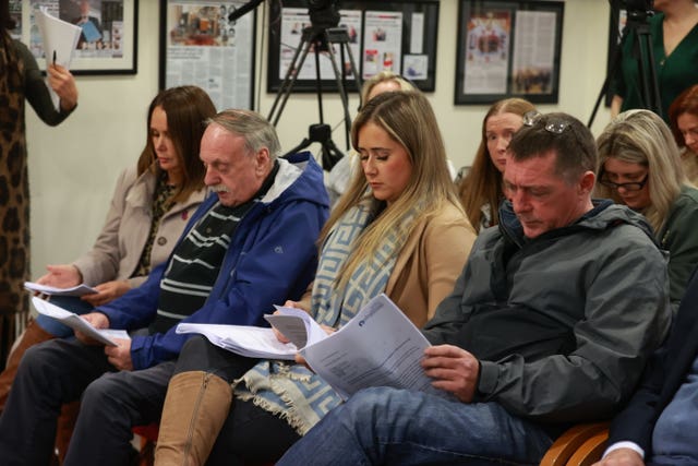 The family of Katie Simpson wait for the start of a press conference at KRW Solicitors in Belfast