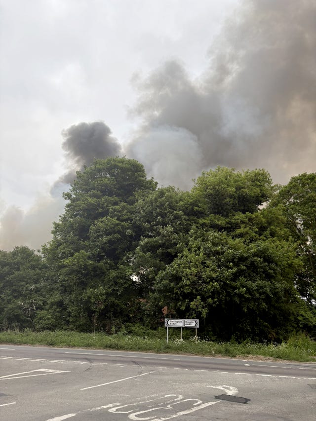 Clouds of smoke seen near the scene of a fire at Bicester Aerodrome