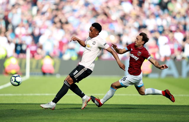 Anthony Martial (left) was given a start