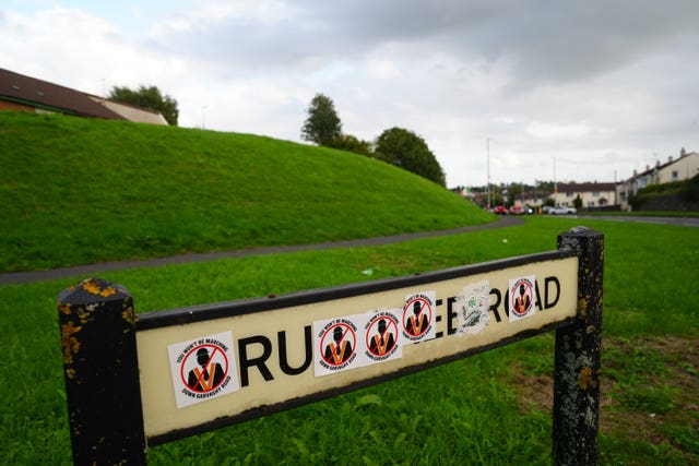 Stickers on a road sign near the Garvaghy Road in Portadown
