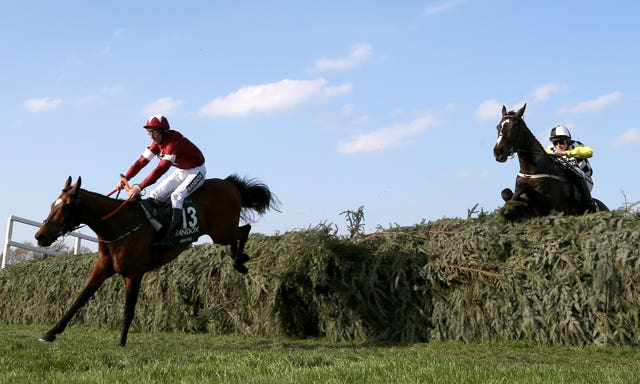 Tiger Roll leads Pleasant Company on the way to Grand National glory