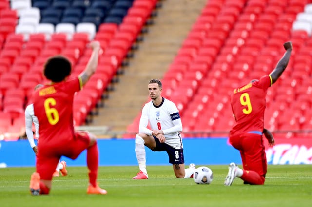 Belgium’s Axel Witsel (left), England’s Jordan Henderson (centre) and Belgium’s Romelu Lukaku take a knee in support of the Black Lives Matter movement 