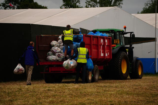 Worker load waste bags