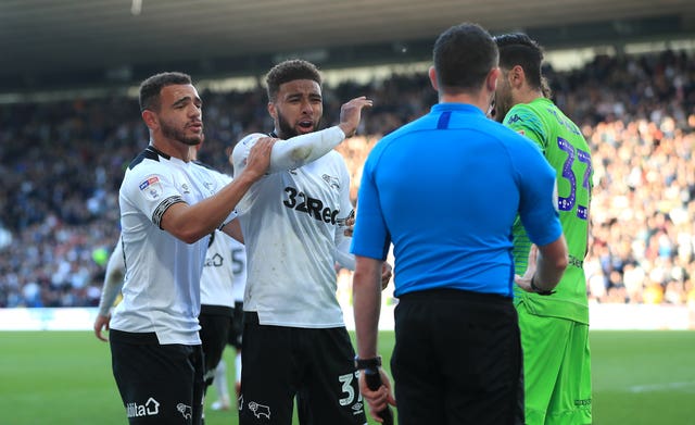 Derby players react after they were awarded a penalty before the decision was overturned during their 1-0 loss to Leeds in the Championship play-offs 