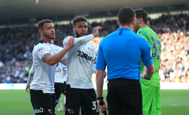 Derby players react after they were awarded a penalty before the decision was overturned during their 1-0 loss to Leeds in the Championship play-offs