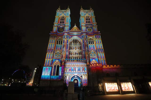 The Light Of The Spirit by Patrice Warrener is projected onto Westminster Abbey (Jonathan Brady/PA)