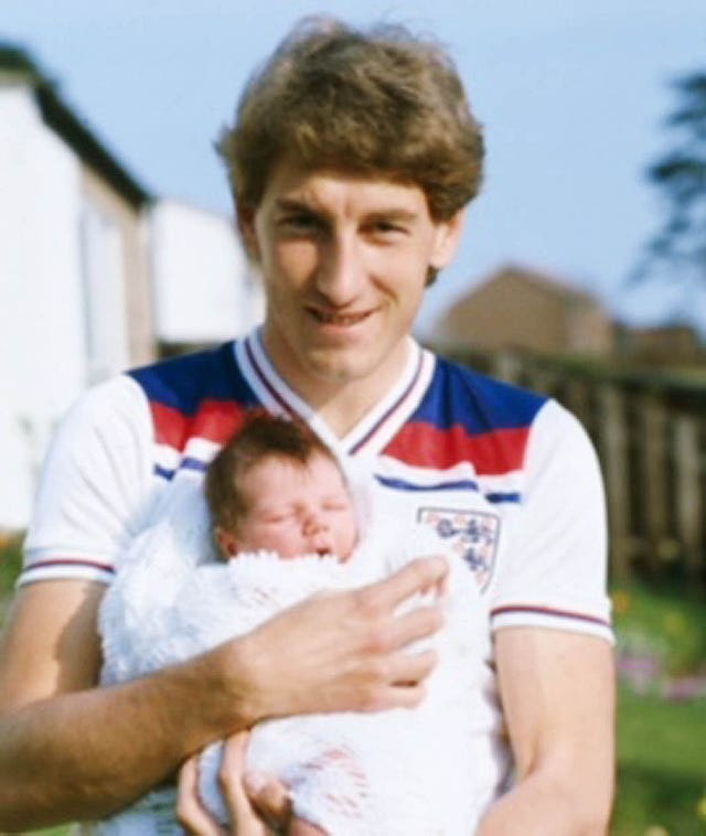 Former England football captain Terry Butcher pictured with Christopher when he was a baby (Family handout/PA) 