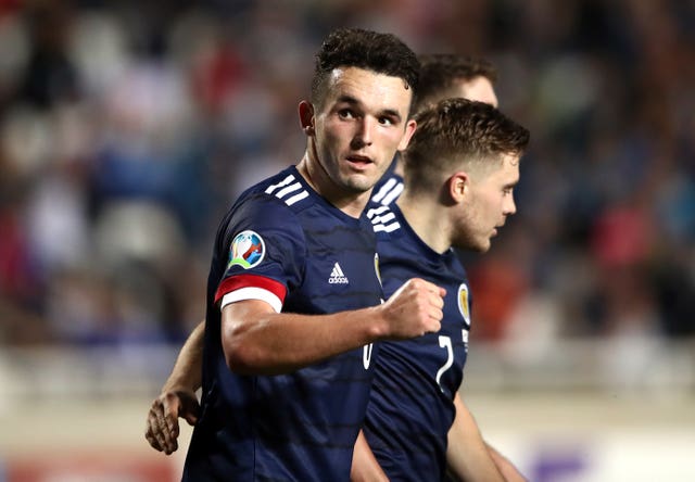 Scotland's John McGinn celebrates scoring the winner