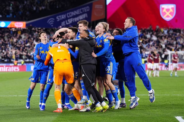 Lucas Perri (centre left) celebrates with team-mates after Leeds' shootout success