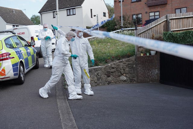 Police and forensic investigators at a property in Pump Hill, Great Baddow in Chelmsford, after a woman was arrested on suspicion of murder