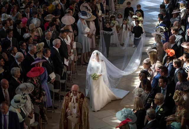 Meghan Markle walks down the Nave (Danny Lawson/PA)