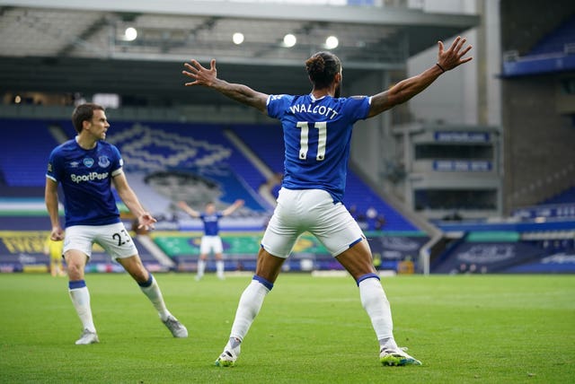 Everton’s Theo Walcott celebrates scoring at the death