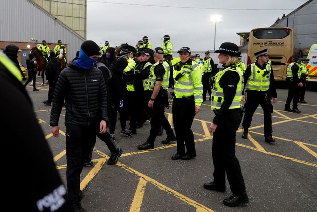 Rangers fans with police