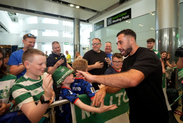 Cape Verde footballer Pico Lopes is greeted by young Shamrock Rovers fans