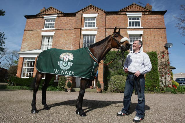Donald McCain won the 2011 Grand National with Ballabriggs