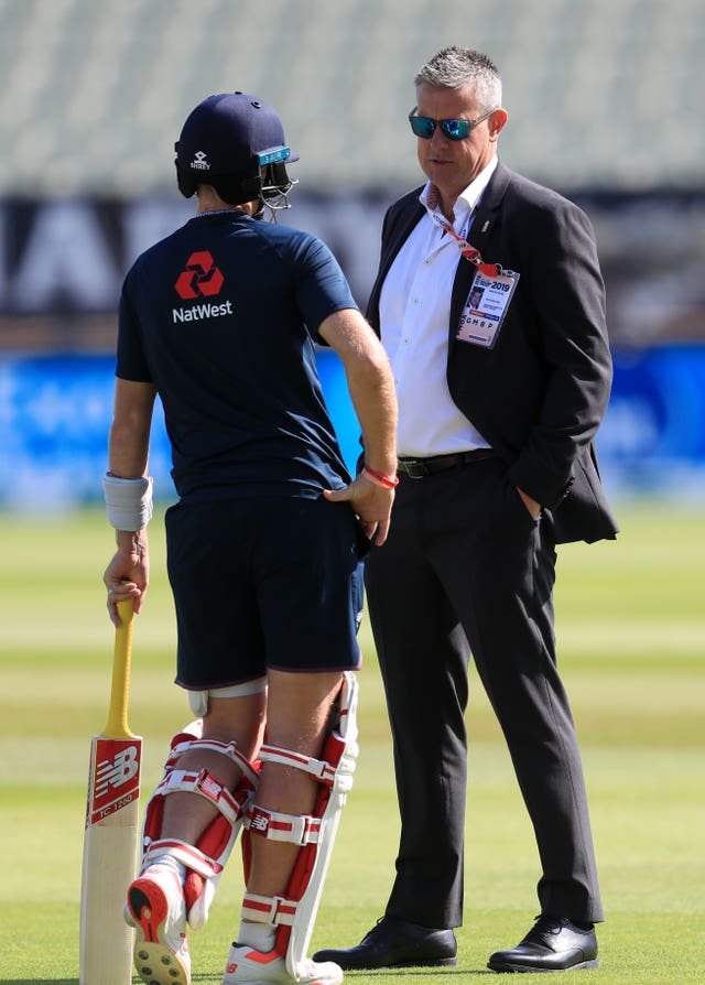 ECB Managing director Ashely Giles (right) speaks with England's Joe Root during day five of the Ashes Test match at Edgbaston